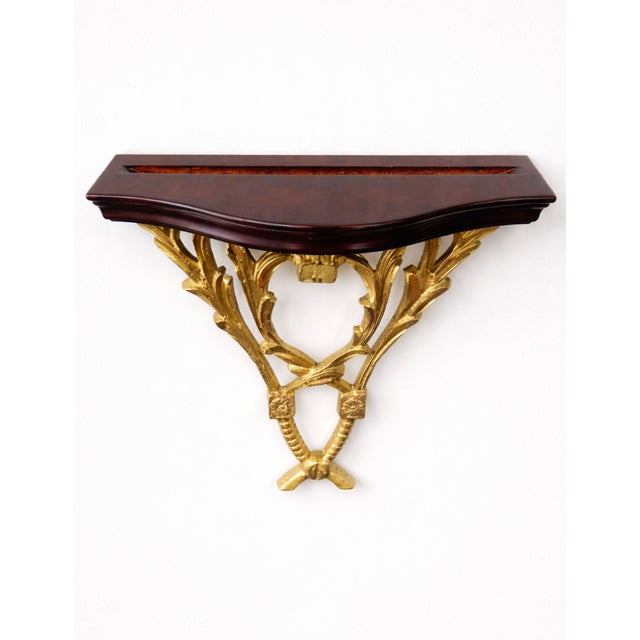 Architectural pair of neoclassical wall-mounted console shelves featuring richly finished mahogany tops with integrated...