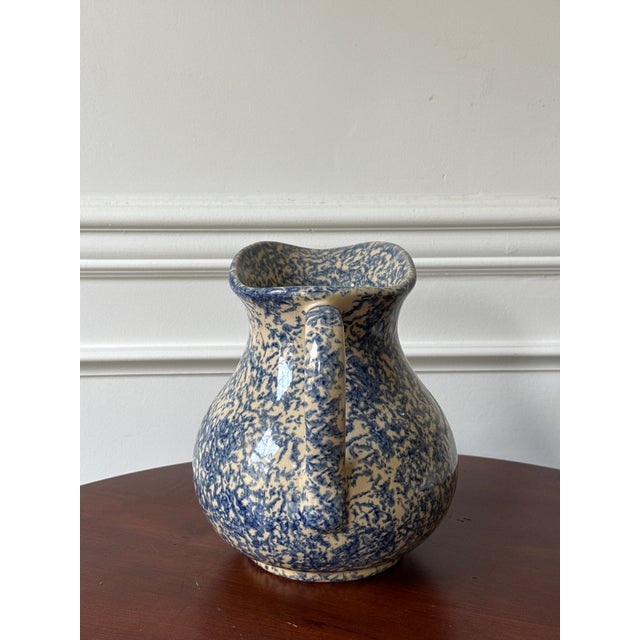 Spongeware is having a moment as it folk art in general. This blue and white spongeware vase is emblematic of all things...