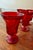Six vintage Fostoria Jamestown Ruby Red Ice Tea Goblets, distinguished by their vibrant deep red color and elegant pressed...