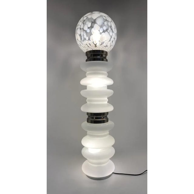 A floor lamp *by Carlo Nason *for Mazzega *Italy *around 1970 *Space Age Design *from Murano glass *with a large Murano...