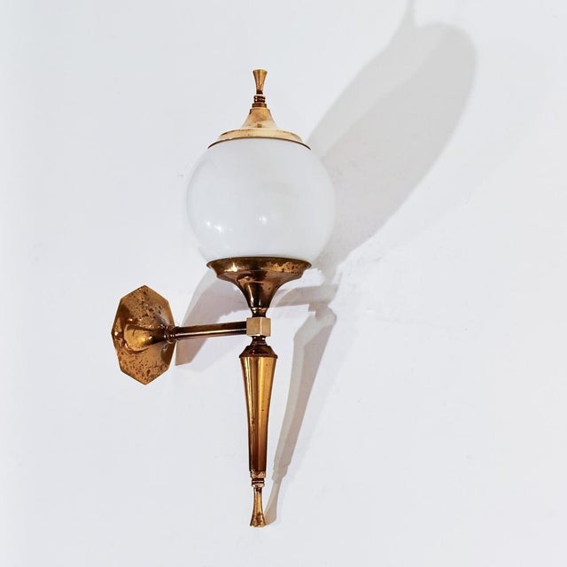 Classic French sconces by Maison Honoré, 1960s, set of 2. Pair of elegant sconces with gold and brass metal structure and...