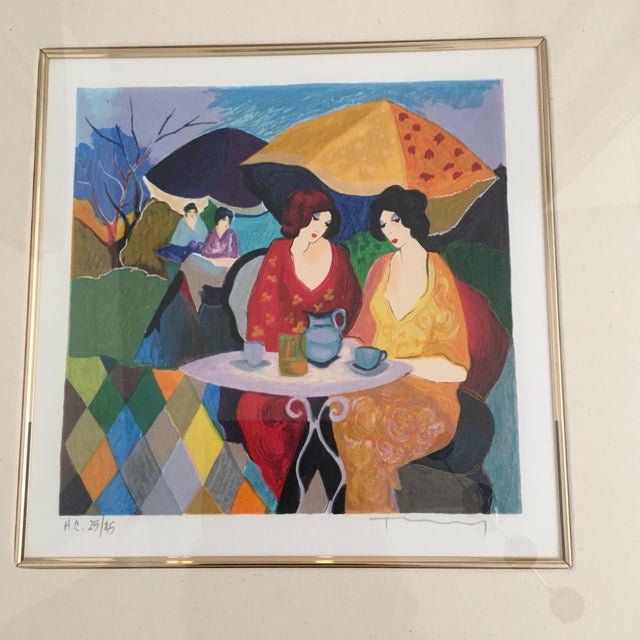 Tarkay “Enchanted moments”. Frame 22x 22”. Art 10x10” Hand signed and numbered “ HC 25/45 Itzchak Tarkay had perspective...
