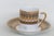This gorgeous espresso cup and saucer set is made of fine porcelain and plated with 24ct gold. This set is stamped as...