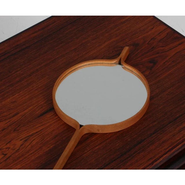 Hans Agne Jacobsson hand mirror in laminated oak.