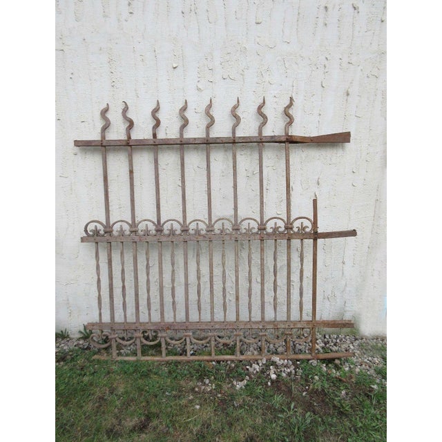 This antique Victorian iron gate is a wonderful piece of architecture. Heavy, tight and sturdy. Piece does show signs of...