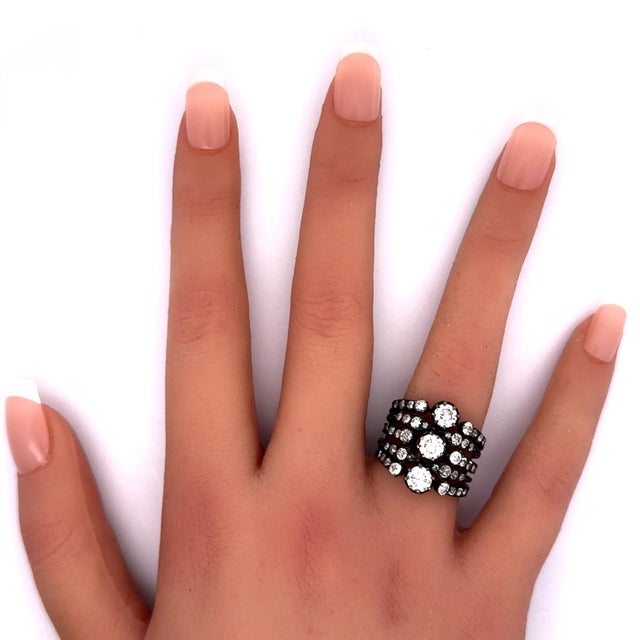 Intricate design. This fashion ring showcases approximately 3 carats of old European cut diamonds, exuding a classic white...