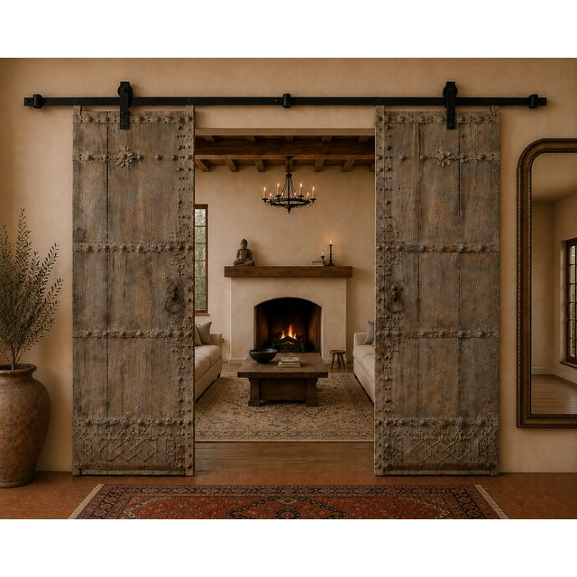 Antique Chinese Pine "Garden" Compound Gate, of monumental proportions featuring iron strapping with nailheads and a very...