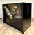 Dating to 1958, this ingenious black lacquer cabinet is one of those pieces that completely surprised me. At first glance...
