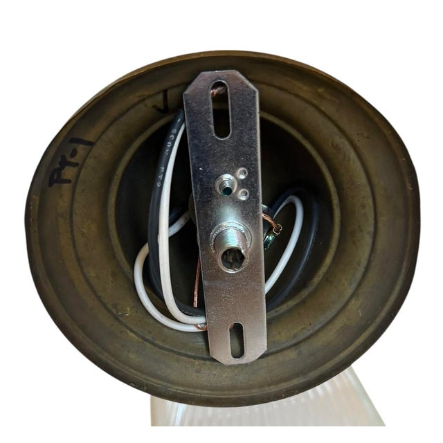 A great sconce that will look fab in any room of the house. Holophane glass Circa 1920’s on original brass holder with...