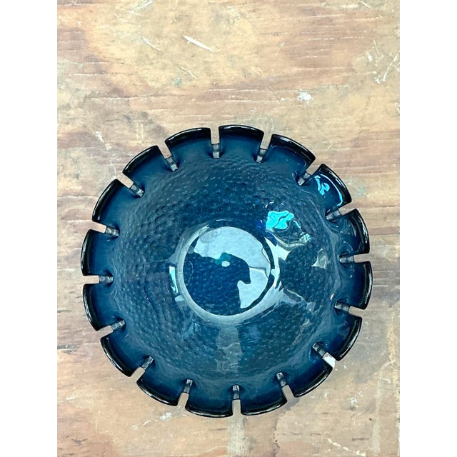This stunning Swedish Mid-Century Modern art glass bowl is a luminous example of master Scandinavian craftsmanship....