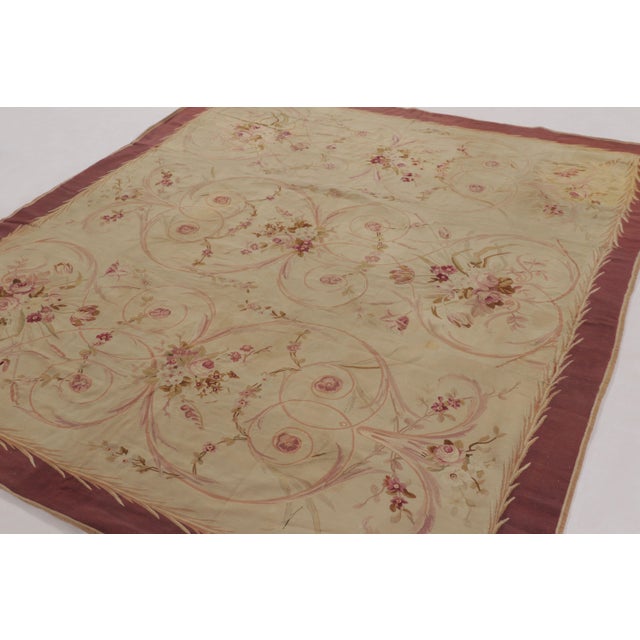 Handwoven in wool and originating circa 1950-1959 from France, this 8x9 vintage French Aubusson carpet joins Rug & Kilim’s...