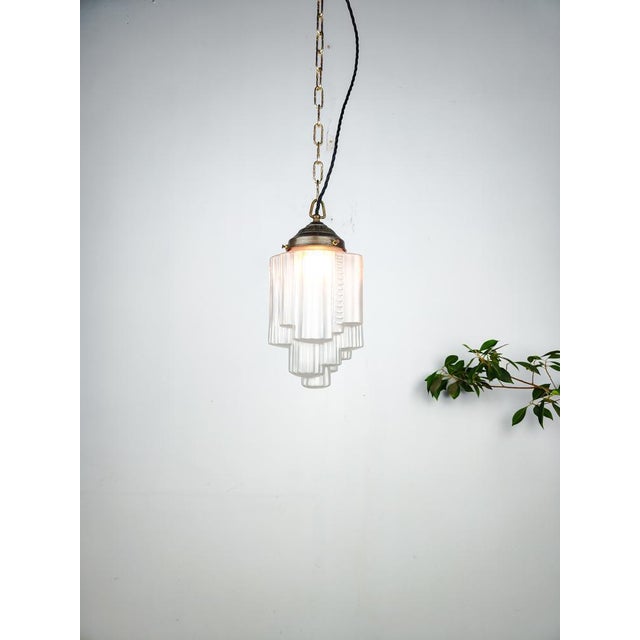 Beautiful early French art deco etched pendant light in rare skyscraper shape. Up to 250V (Europe/UK Standard).The wiring...