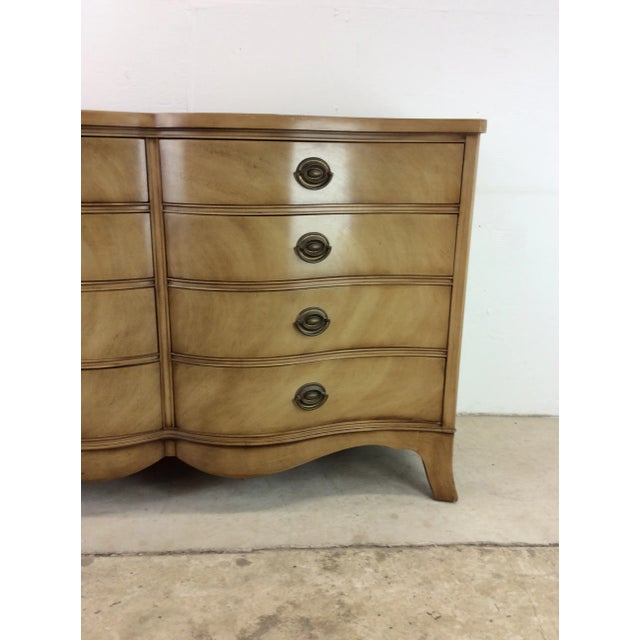 This mid century eight drawer dresser by Drexel features hardwood construction, bleached walnut veneer with original...