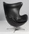 Arne Jacobsen lounge chair model Egg. Original upholstered with black semi aniline leatherleather. Four star base. with...