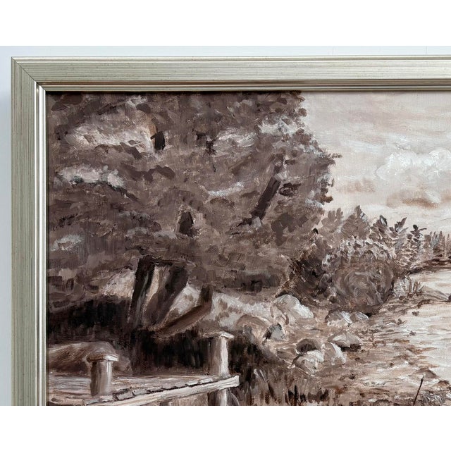 Sepia oil landscape painting on linen canvas in a warm silver-colored frame. Signed on the lower left. Nancy’s Bio: Nancy...