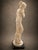Embrace timeless elegance with this Vintage Neoclassical Maiden Sculpture. Standing at 17 inches, this stunning classical...