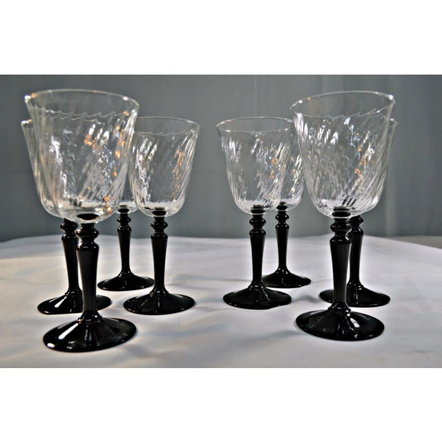 Magnificent and glamorous set of 8 goblets, wine or water glasses Onyx black stem/ crystal clear bowls. These are all in...