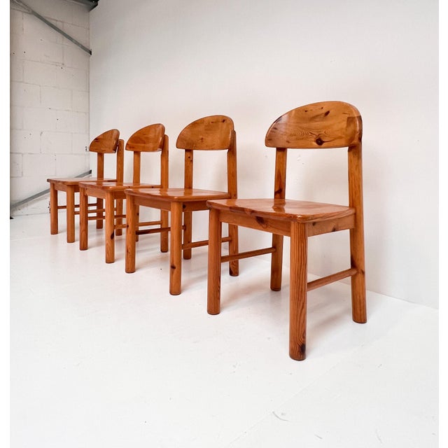 Danish design from the 1970s! This set consists of 4 organically shaped dining room chairs, designed by Rainer Daumiller...