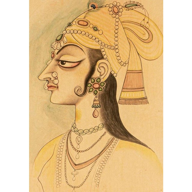 A finely executed Indian miniature painting depicting a regal princess in profile, traditionally attributed to the Mughal...