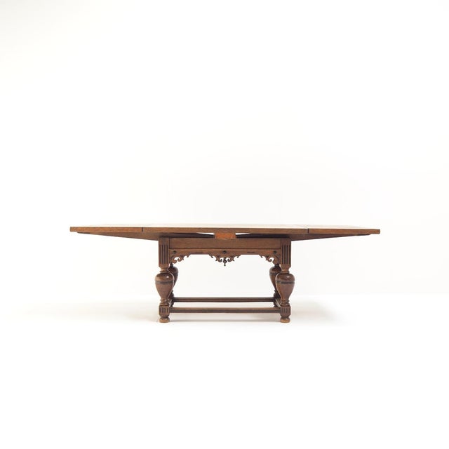A beautiful dutch antique draw-leaf table with authentic wear and tear, showing its age and history in all the right ways....