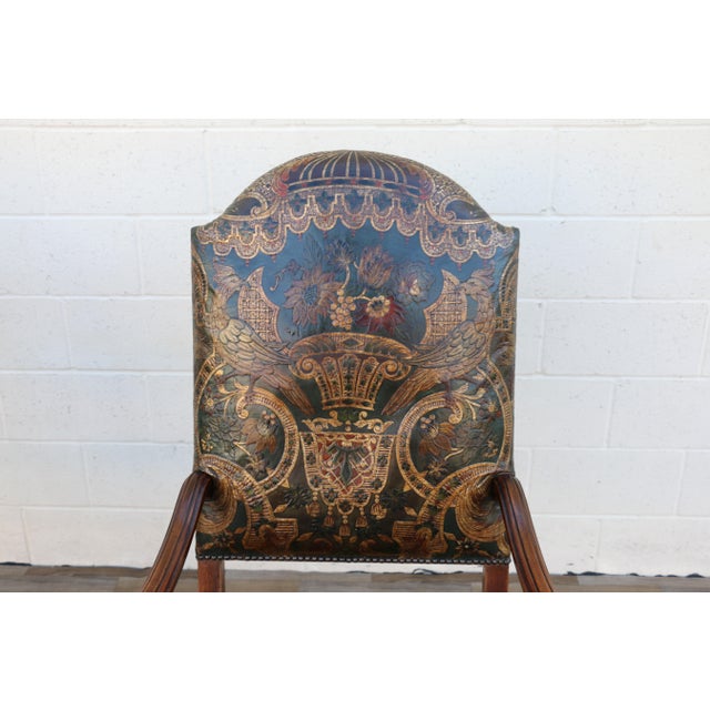 Exceptional pair of early 18th-century armchairs featuring richly carved solid wood frames and beautifully detailed...