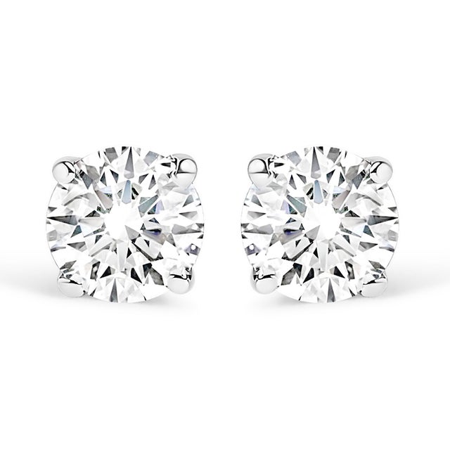 Celebrate any occasion with these classic shimmering diamond stud earrings. Crafted from 14k white gold each earring...