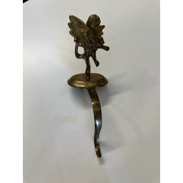 Antique Brass Cherub Stocking Holder For Sale - Image 4 of 4