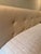 Queen bed frame in a beige / taupe weave fabric with headboard. Modern, low-profile, upholstered platform bed with inset...