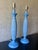 A stylish pair of vintage table lamps featuring a sculptural basket weave motif in a vibrant powder blue finish. Their...