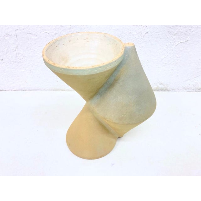 Vase signed on the side, signature illegible. Ceramic. Good used condition. Minor chips on the lower rim. 22 x 18 x 11 cm...