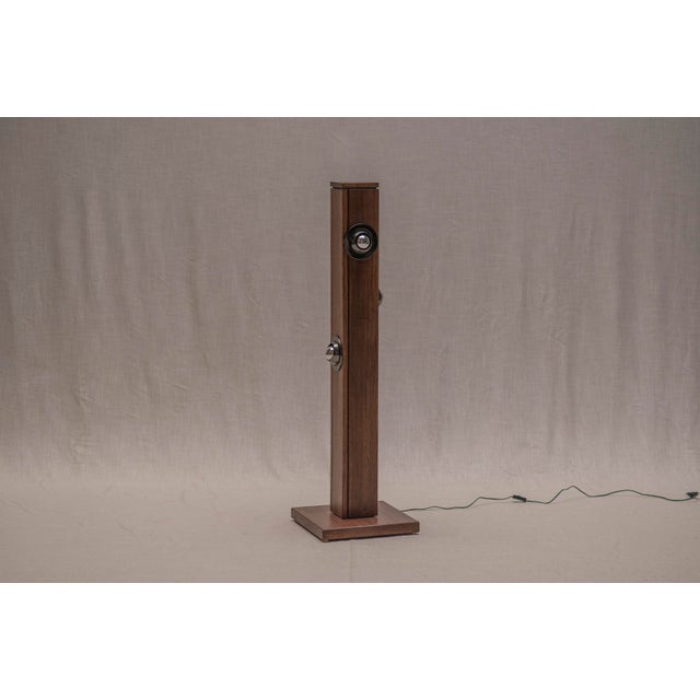 A striking Dutch floor lamp from the 1960s–1970s, combining the warmth of natural oak with refined chrome detailing and a...