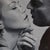 The Kiss #5 by Linda Delahaye | Oil on Panel Close-up of a couple about to kiss For Sale