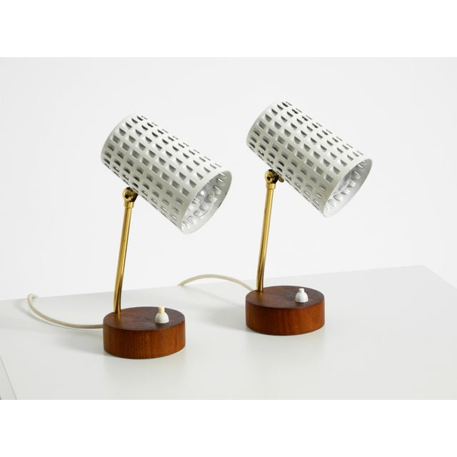 Two very beautiful, rare Mid-Century Modern bedside lamps. Very good, undamaged original condition. with perforated metal...