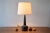 Mid-century Danish ceramic table lamp designed by Per Linnemann-Schmidt for Palshus. Made circa 1960s. The lamp is made...