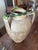 This glazed biat urn has a rustic brown exterior, with a stunning green glaze on the top. This urn would be perfect for...