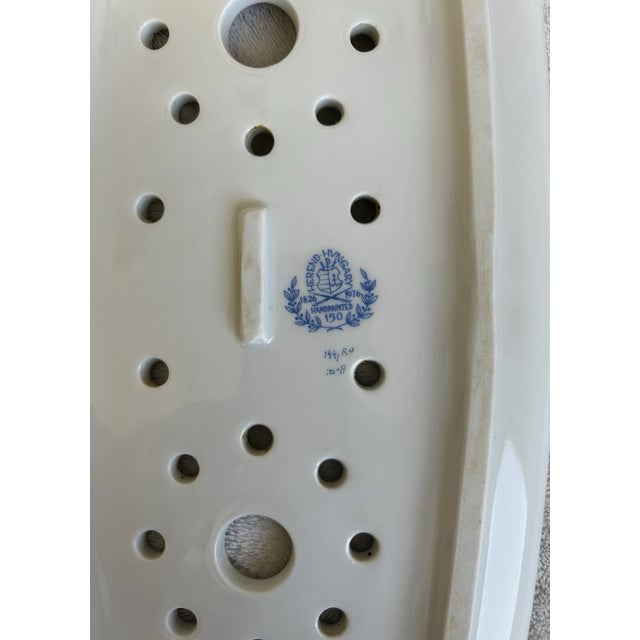 Bring timeless elegance to your table with this exquisite Herend Rothschild Bird porcelain fish platter, a true testament...