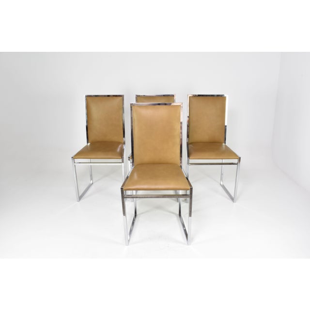 Set of four Italian dining chairs identified as La Metal Arredo Paderno D. Mi, from the 1970s. Their chromed-metal frames...