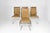 Set of four Italian dining chairs identified as La Metal Arredo Paderno D. Mi, from the 1970s. Their chromed-metal frames...