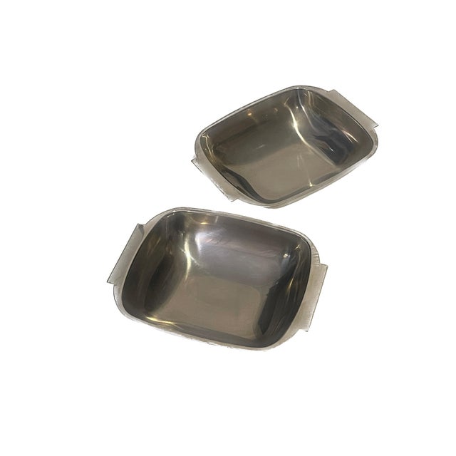 This sophisticated pair of vintage stainless steel bowls was designed by Arthur Salm and manufactured in Sweden during the...