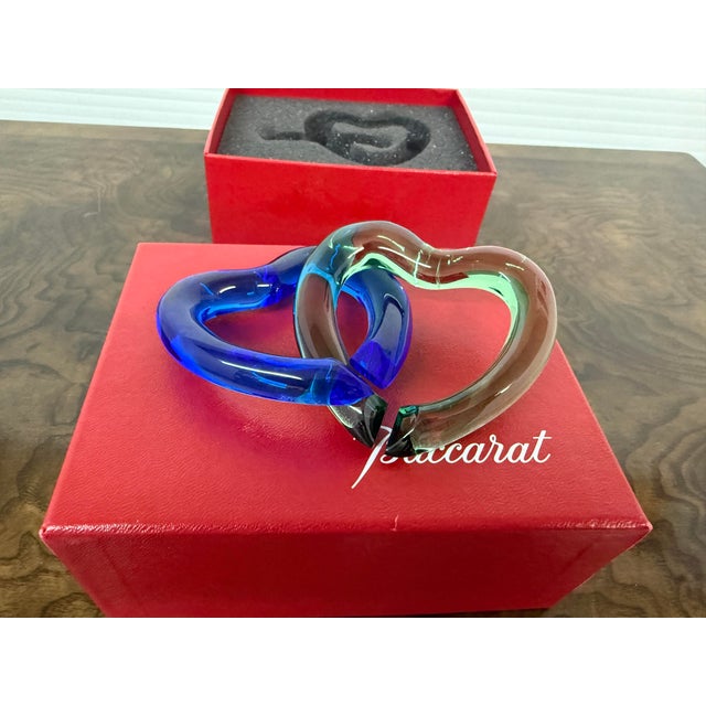 Design Plus Gallery presents a Pair of Linking Hearts + Original Box from Baccarat. This is a wonderful set to produce to...