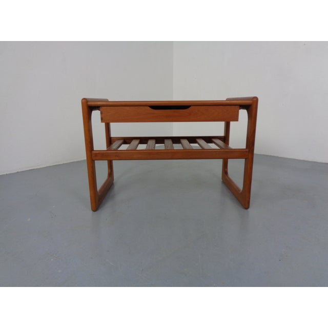 Danish side table with shelf and a drawer with various compartments by Salin Nyborg from the 1960s. This piece has an...