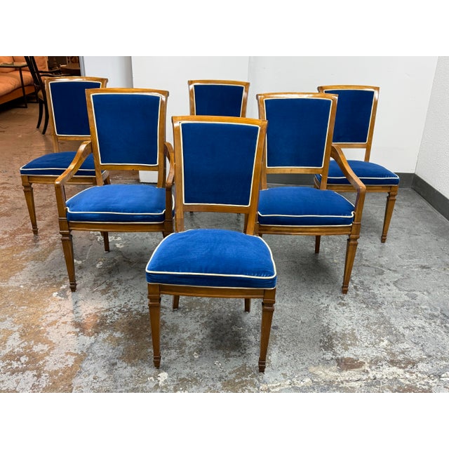 Design Plus Gallery presents a Set of Six Neoclassical Dining Chairs from Heritage. Each chair has a sculpted wood frame,...