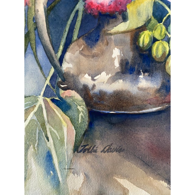 1980s watercolor by coastal North Carolina artist Tollie Davis of spring flowers and pottery including a Delft pitcher....