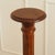 A column-shaped wooden stand from the Wilhelminian era, dating from around 1870–1890, crafted from solid hardwood with a...