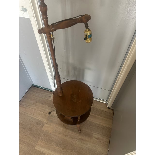 Add timeless mid-century modern style to your home with this rare George Bent two-tier floor lamp and table combination. A...