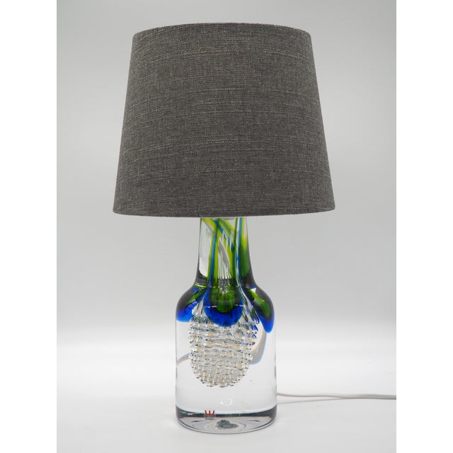 This hand-blown lamp with glass bubbles inside is very rare because Göran Wärff's glass lamps are all unique and made in...