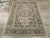 This Early 20th century Persian Tabriz rug, measuring 4' 1" x 5' 8", showcases the refined artistry and balanced elegance...