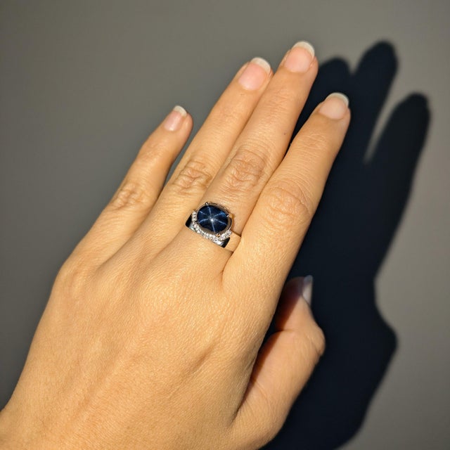 This lovely 6.15 carat star sapphire ring is made in solid 14k gold with natural earth mined diamonds in solid 14k gold....
