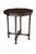 This antique Jacobean-style side table is a beautifully crafted wooden piece featuring a distinct octagonal top made from...