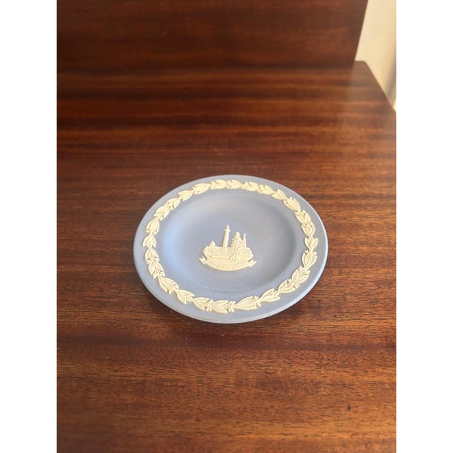 Classic Wedgwood blue jasperware small decorative dish featuring a raised white bas-relief ornamentation of Trafalgar...
